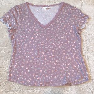 Lavender short sleeve top with delicate floral print in peach and dusty green